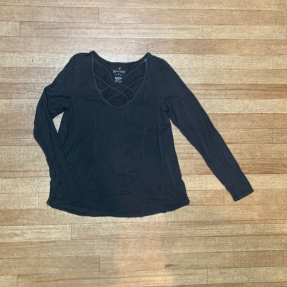 Women’s dark gray long sleeve with v neck detail on chest